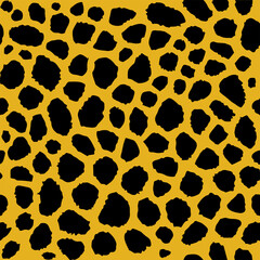 Striking black irregular spots on a warm yellow background creates a bold and energetic animal print pattern