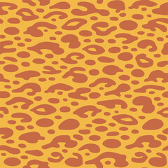 Abstract orange and yellow spotted pattern resembling animal print, perfect for fashion textiles and graphic design backgrounds