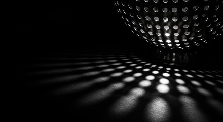 Close-up of a metal colander casting shadows