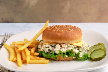 chicken  salad sandwich  with french fries