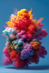 Vibrant cloud of colorful ink explosion on a vibrant blue background