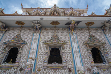 Wat Pariwat Temple, is new famous Buddhism temple in Bangkok locate on Rama 3 Road, Bangkok Thailand. It features unique beautifully crafted Thai mosaic depictions of popular cultural icon
