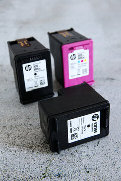 Empty HP printer cartridges on a light background