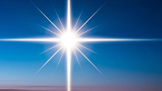 Animation of the star of Bethlehem with radiant beams across a blue sky background