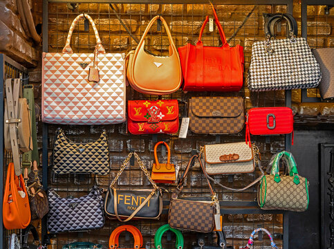 Counterfeit bags from popular brands sold outside on a market in Istanbul