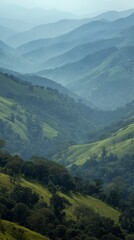 Fototapeta premium misty mountain landscape with rolling green hills and foggy horizon