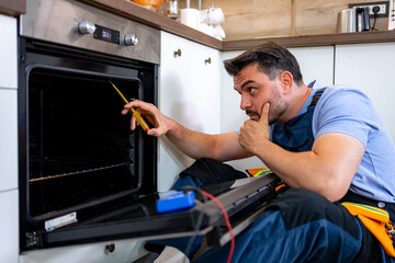 Repairing a kitchen oven with focus on troubleshooting issues at home