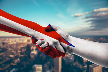 Shaking hands Austria and Nepal