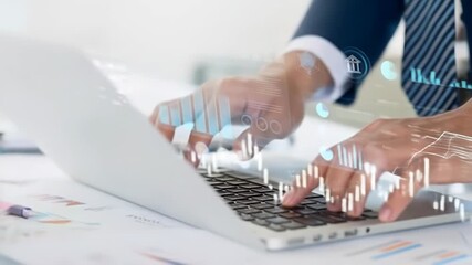 Close-up of hands typing on a laptop with overlaid financial data visualizations (1) - Powered by Adobe