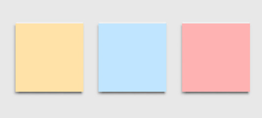 Three colorful blank square sticky notes