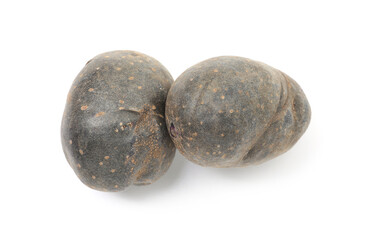 Fresh purple potatoes isolated on white, top view