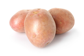 Three fresh ripe potatoes isolated on white