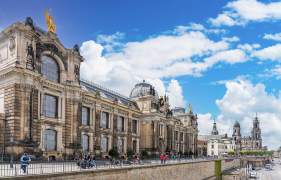 Dresden, Germany 8 may 2025 - Tourists passing the Academy of Fine Arts Dresden at the river Elbe in Dresden