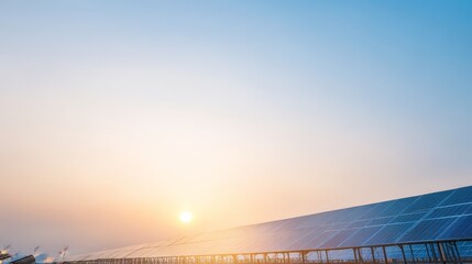 Fototapeta premium Solar Panels at Sunset: Harnessing Renewable Energy