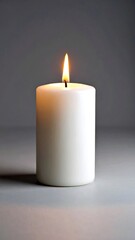 Single White Cylindrical Candle with Flame Against Gray Background.
