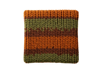 A square knitted throw pillow, featuring horizontal stripes of warm orange, muted olive green, and deep brown tones, is presented on a black background.