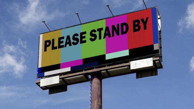 advertising billboard with television broadcast test cards on the screen