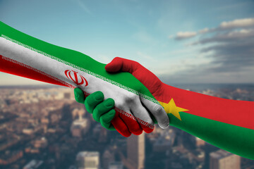 Shaking hands Iran and Burkina Faso