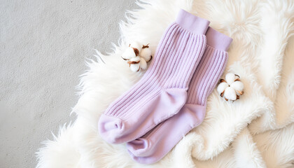 fuzzy socks sticking from blanket, Copy space,  background