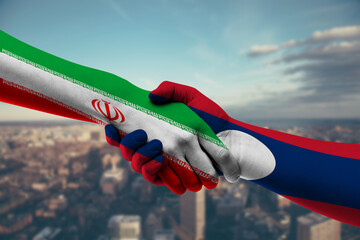 Shaking hands Iran and Laos