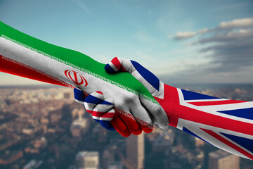 Naklejka premium Shaking hands Iran and UK