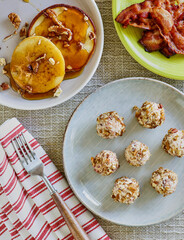 bacon maple pancake balls made with cream cheese and chopped nuts