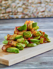 bacon wrapped avocado bites topped with sea salt