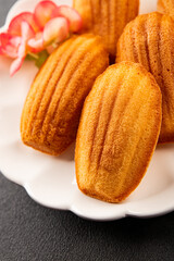 Madeleine cookies sweet dessert traditional french sweets tasty snack fresh delicious gourmet food background on the table rustic top view copy space