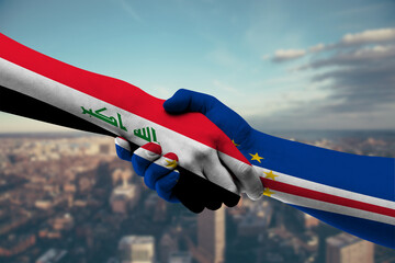 Naklejka premium Shaking hands Iraq and Cabo Verde