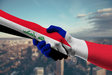 Shaking hands Iraq and France