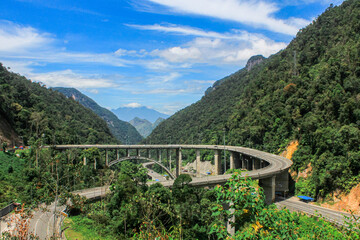 Curved Elevated Highway in the Middle of Tropical Mountain Forest &ndash; Kelok 9, West Sumatra, Indonesia