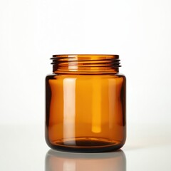 Empty amber glass jar with screw top threads stands on white reflective surface. Versatile container suits apothecary, eco-friendly packaging, sustainable lifestyle themes. Vintage aesthetic