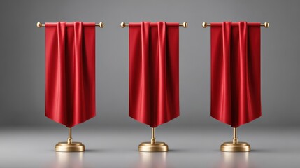 Three elegant red curtains hang from golden rods, creating a sophisticated and dramatic effect against a neutral background.