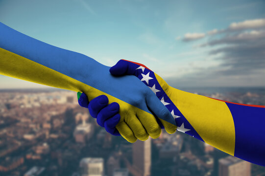Shaking hands Ukraine and Bosnia and Herzegovina
