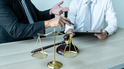 Professional Male lawyer or counselor discussing negotiation legal case with client meeting with...