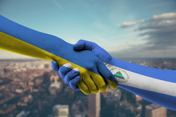 Shaking hands Ukraine and Nicaragua