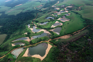 Environmental Destruction: Illegal Gold Mining in the Deforested Amazon, Causing Mercury Contamination and Global Warming