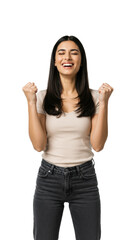 Obraz premium Young adult woman with dark hair, olive skin, smart-casual wear, mid-cheer with closed eyes and clenched fists, on a white studio background. Concept of triumph and achievement