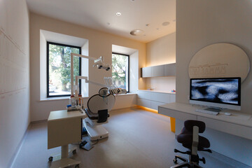 A Modern Medical Examination Room Featuring Advanced Equipment for Patient Care and Comfort