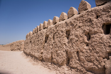 Ancient mudbrick walls of the historic city of Khiva in Uzbekistan