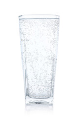 Refreshing soda water in glass isolated on white