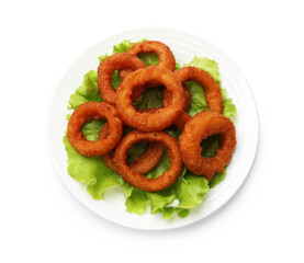 Fried squid rings and lettuce isolated on white, top view