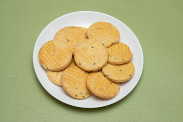 Classic baked salted cookies on a plate side view of Bangladeshi food