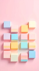 Pastel colored blocks arranged on a pink background