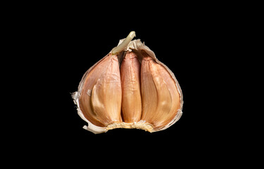 Garlic Bulb Segment Isolated on Black Background