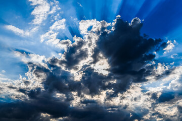 Dramatic Cloudscape with Sun Rays Breaking Through