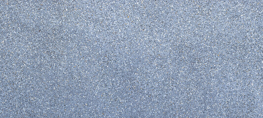 Pebble wall surface with rough texture and natural appearance