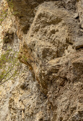 the structure of the rock surface in the section, quarrying in the natural environment, sunny day
