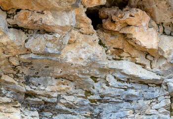 the structure of the rock surface in the section, quarrying in the natural environment, sunny day