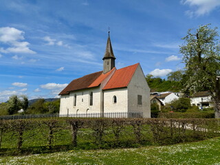 Tiny 'New Year's Chapel' (Silvesterkapelle) on Lake Constance in Überlingen, Germany - Medium Wide Shot